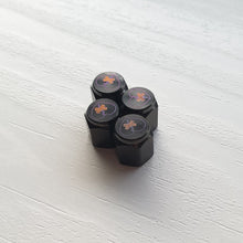 Load image into Gallery viewer, Shattered Hearts Titanium Valve Stem Caps