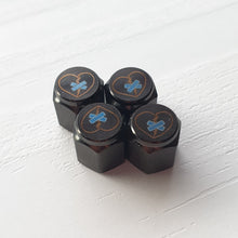 Load image into Gallery viewer, Shattered Hearts Titanium Valve Stem Caps
