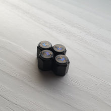 Load image into Gallery viewer, Shattered Hearts Titanium Valve Stem Caps
