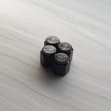 Load image into Gallery viewer, Shattered Hearts Titanium Valve Stem Caps
